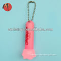 pink small flashlight plastic figurine with ball chain